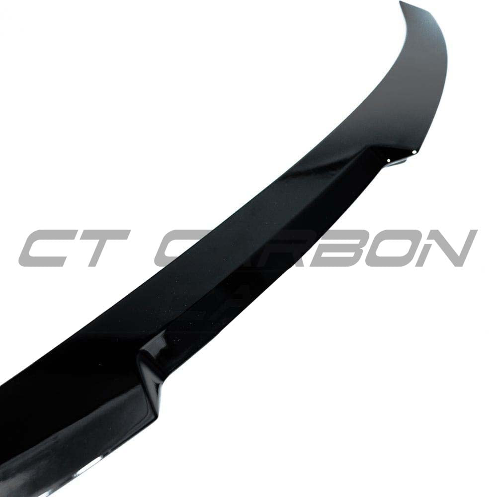 BMW M4 F82 coupe with CT Carbon full gloss black kit, showcasing sleek, high-quality carbon fiber exterior enhancements.