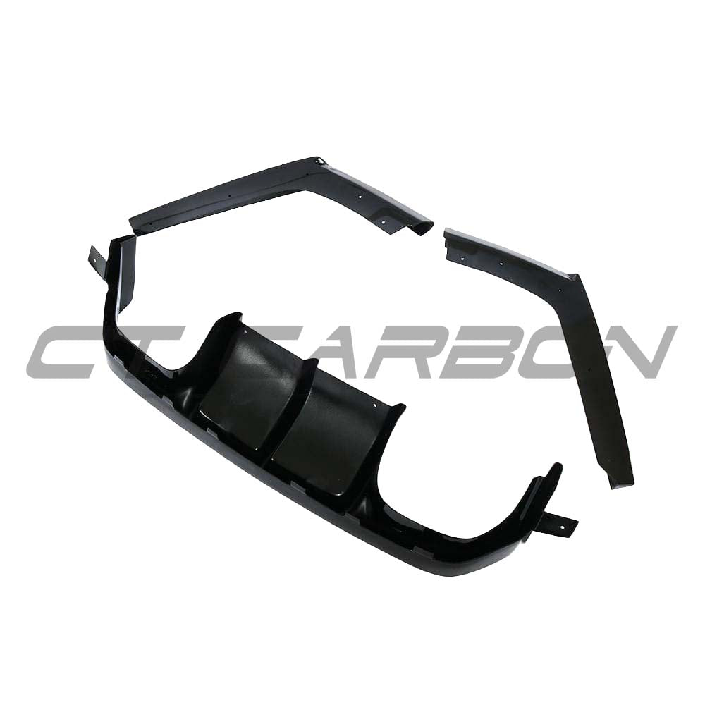 Full gloss black kit for BMW M4 F82 coupe by CT Carbon, showing sleek, high-quality carbon fiber body parts and accents.
