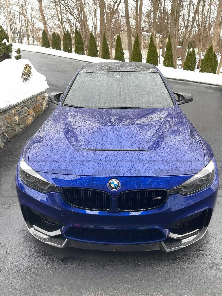BMW F82 M4 Coupe 2014-2020 CT Carbon full carbon fiber kit with CS style accents, shown on a sleek black BMW M4 F82.