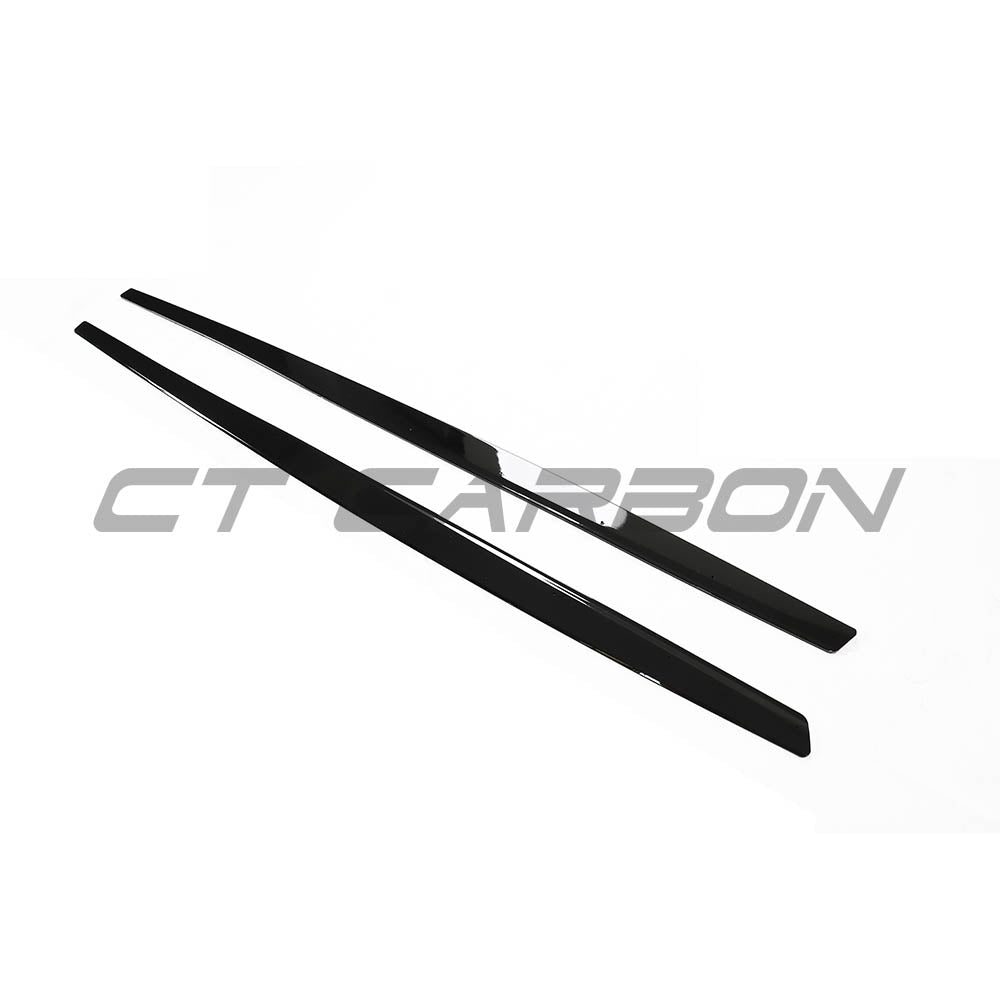 BMW M4 F82 coupe full gloss black kit by CT Carbon, showcasing the sleek, high-gloss black exterior components.