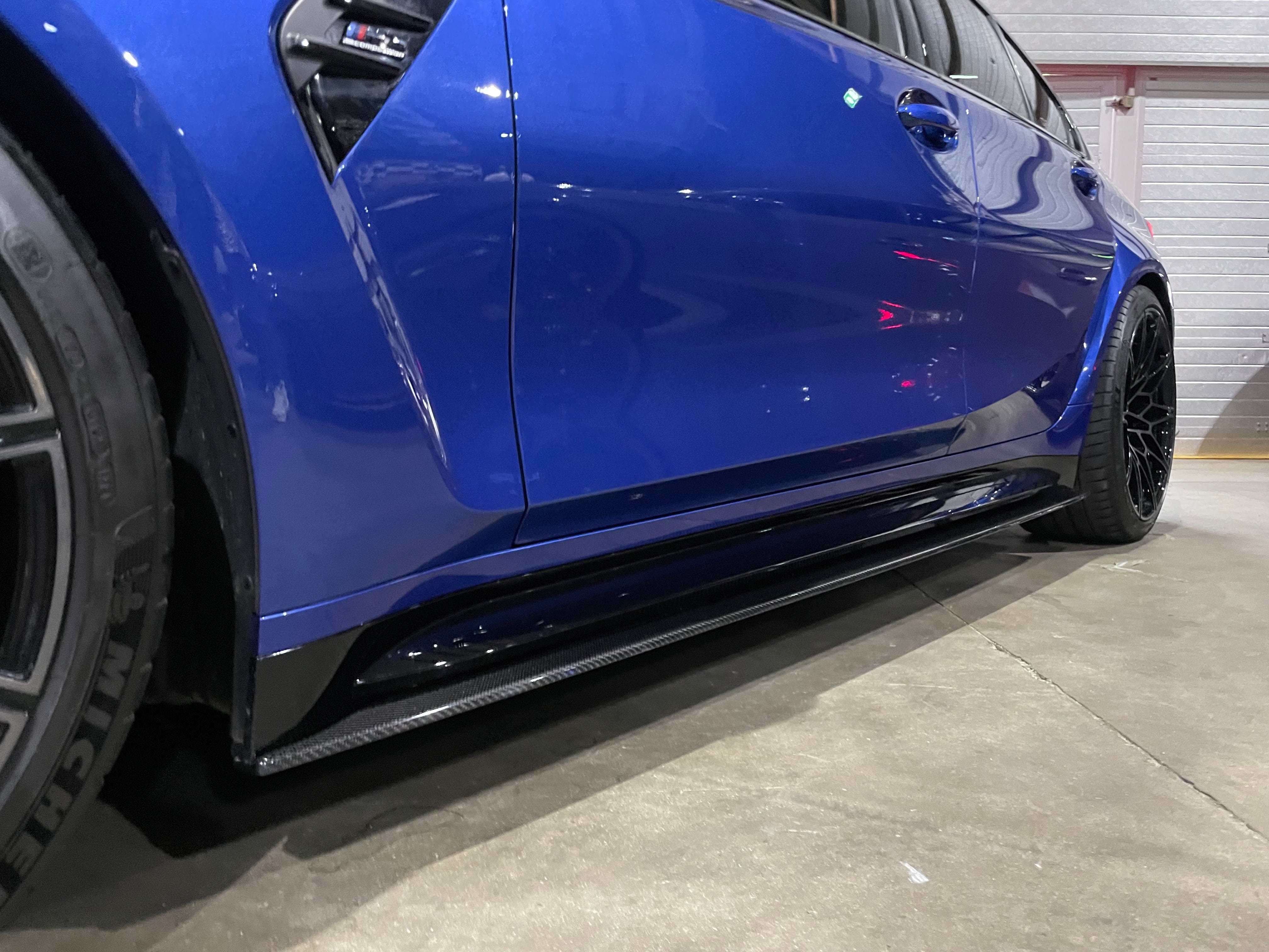 BMW M4 G82 G83 carbon fibre side skirt extensions by CT Carbon, showcasing sleek, lightweight design on the car's side profile.