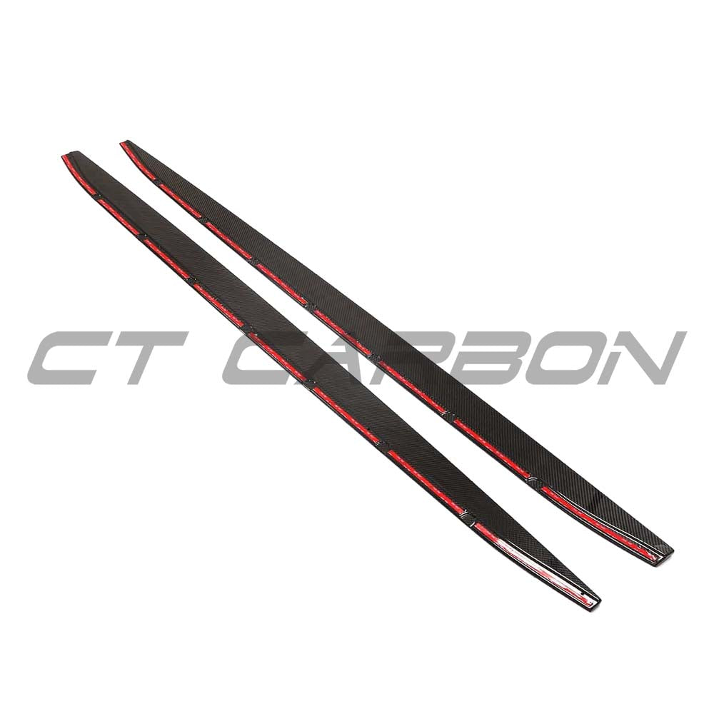 BMW G83 M4 full carbon fibre kit with side skirt extensions, showcasing sleek black carbon fiber and aerodynamic design by CT Carbon.