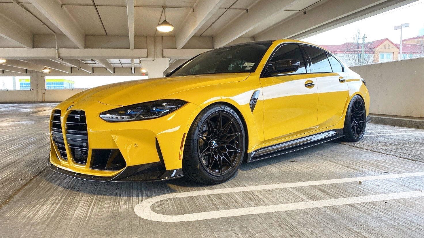 BMW M4 G82 G83 carbon fibre side skirt replacement by CT Design, showing sleek, lightweight side skirts on the vehicle.