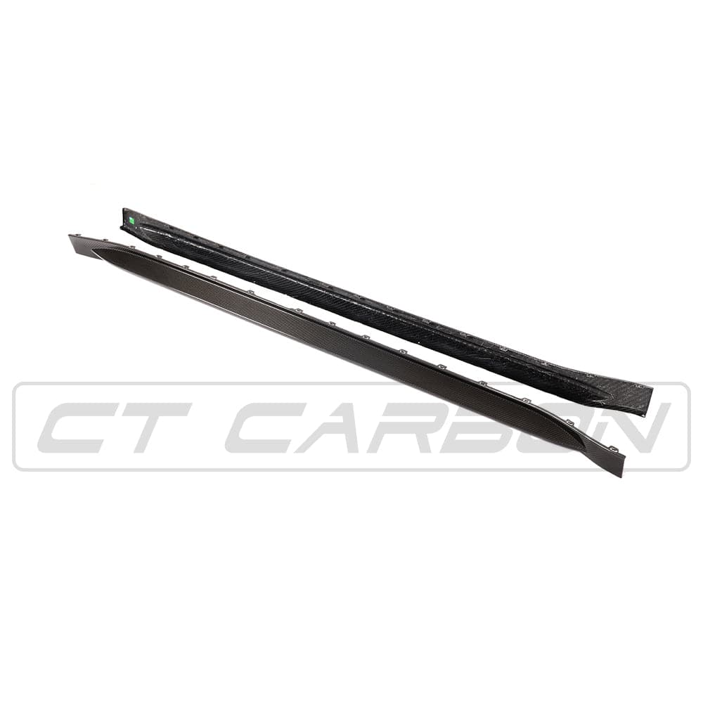 BMW M4 G82 G83 carbon fiber side skirt replacement by CT Design, showcasing the sleek, textured carbon fiber surface and fitment details.