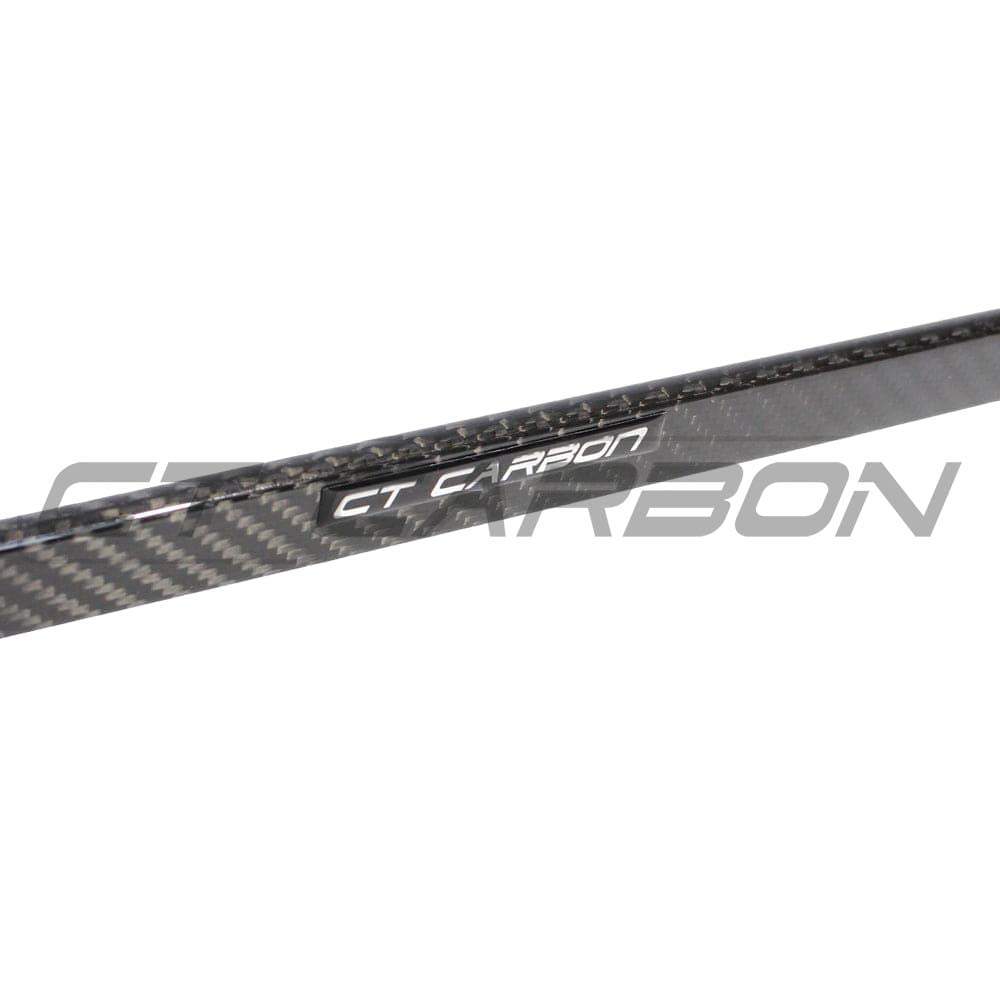 BMW G22 4 Series carbon fibre kit by CT Carbon, featuring a spoiler and MP style accents on a sleek vehicle.