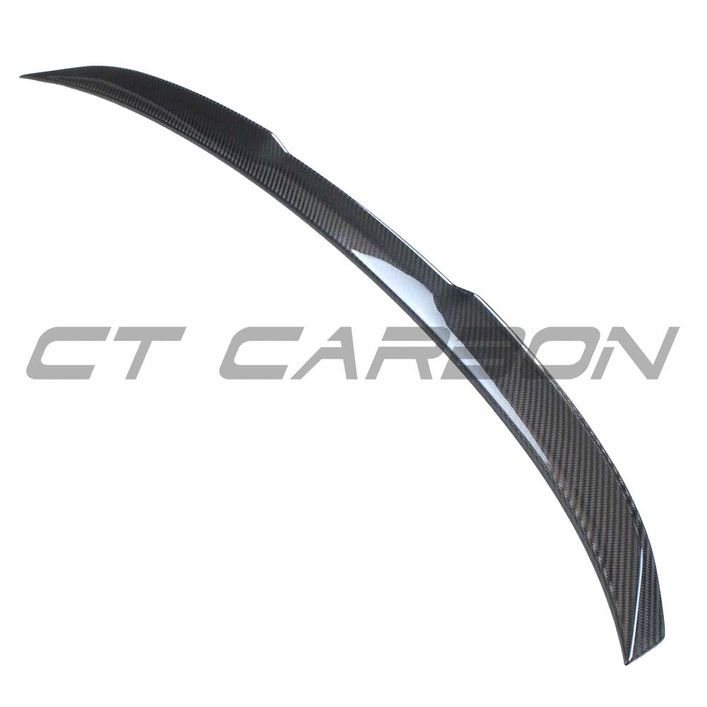 BMW G22 4 Series carbon fibre kit by CT Carbon, featuring sporty spoiler and aerodynamic components on a sleek vehicle.