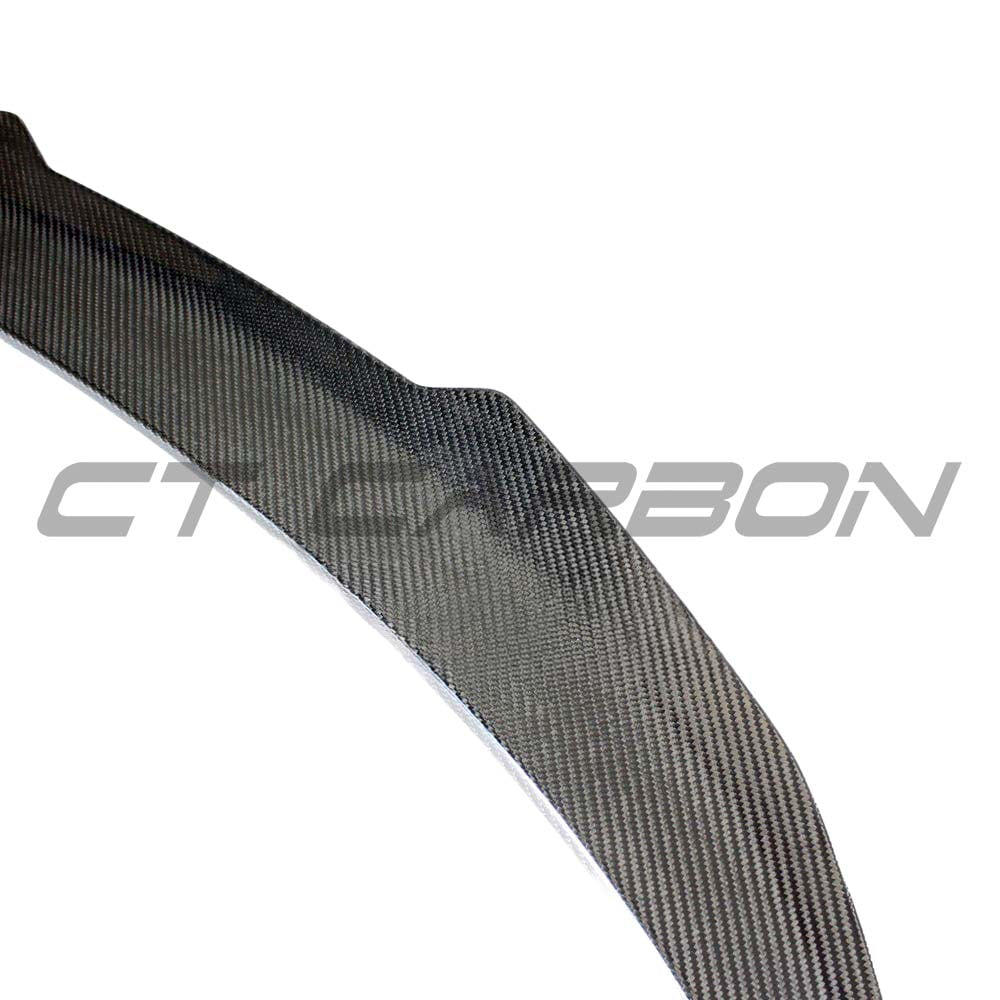 BMW M4 G82 G22 Carbon Fibre Spoiler by CT Carbon, showcasing sleek V1 design on a sporty car.