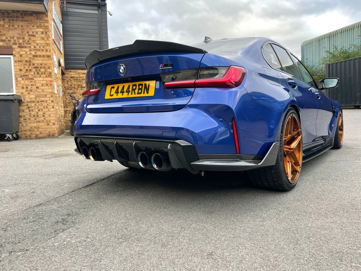BMW M4 G82 G22 Carbon Fibre Spoiler by CT Carbon, showcasing sleek, lightweight aerodynamic design on a sports coupe.