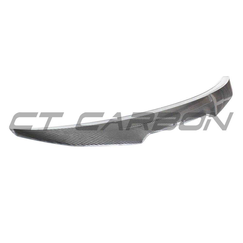 BMW G22 4 Series carbon fibre kit by CT Carbon, featuring a sleek, glossy spoiler and stylish PS style design for a sporty look.
