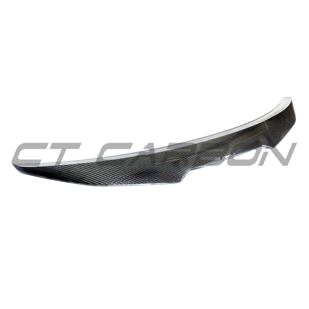 BMW M4 G82 G22 Carbon Fibre Spoiler by CT Carbon, V1, showcasing the sleek aerodynamic design and textured carbon fiber surface.