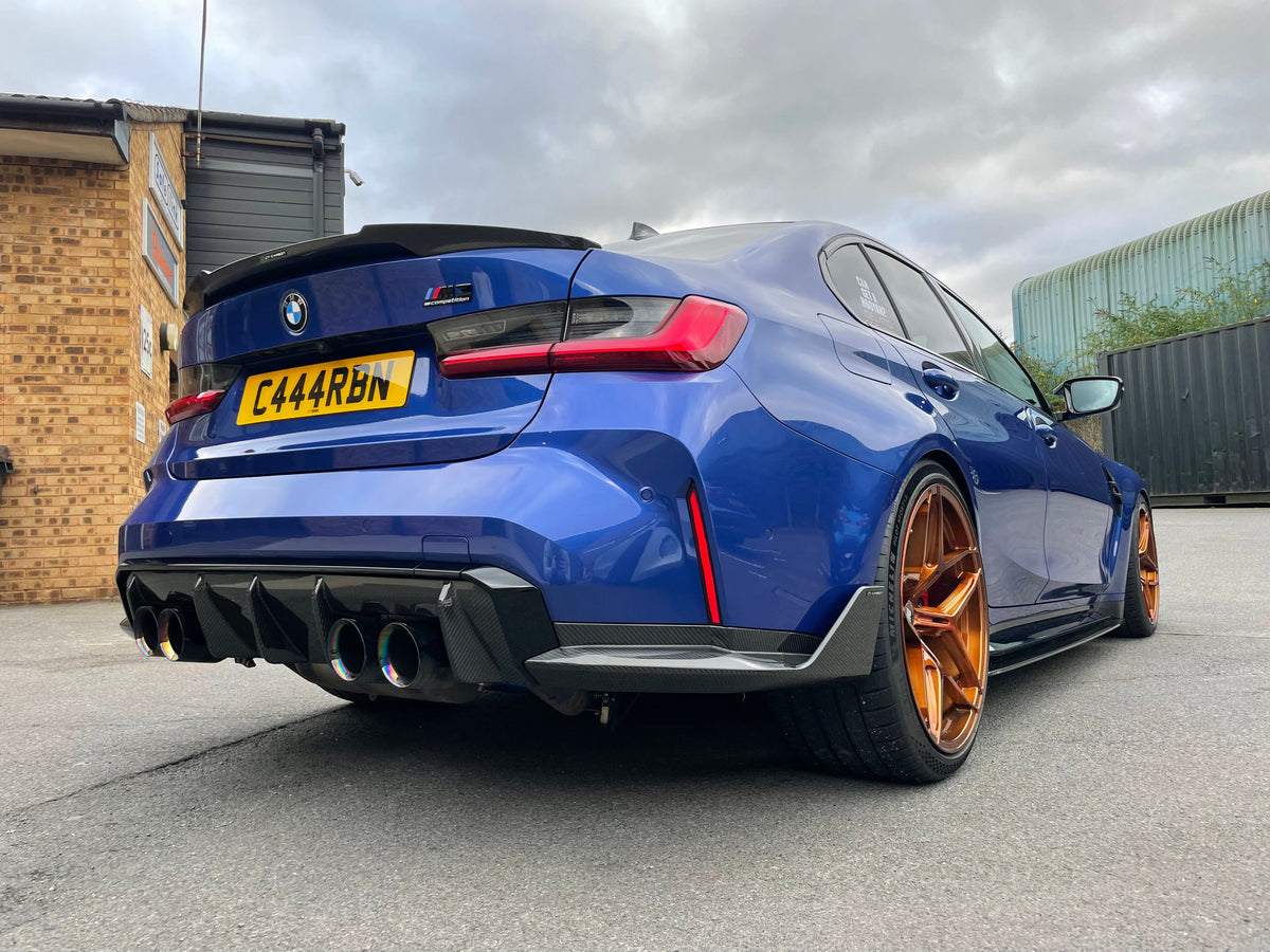 BMW M4 G82 G22 Carbon Fibre Spoiler by CT Carbon, V3 style, showing sleek carbon fiber finish on the sporty car accessory.