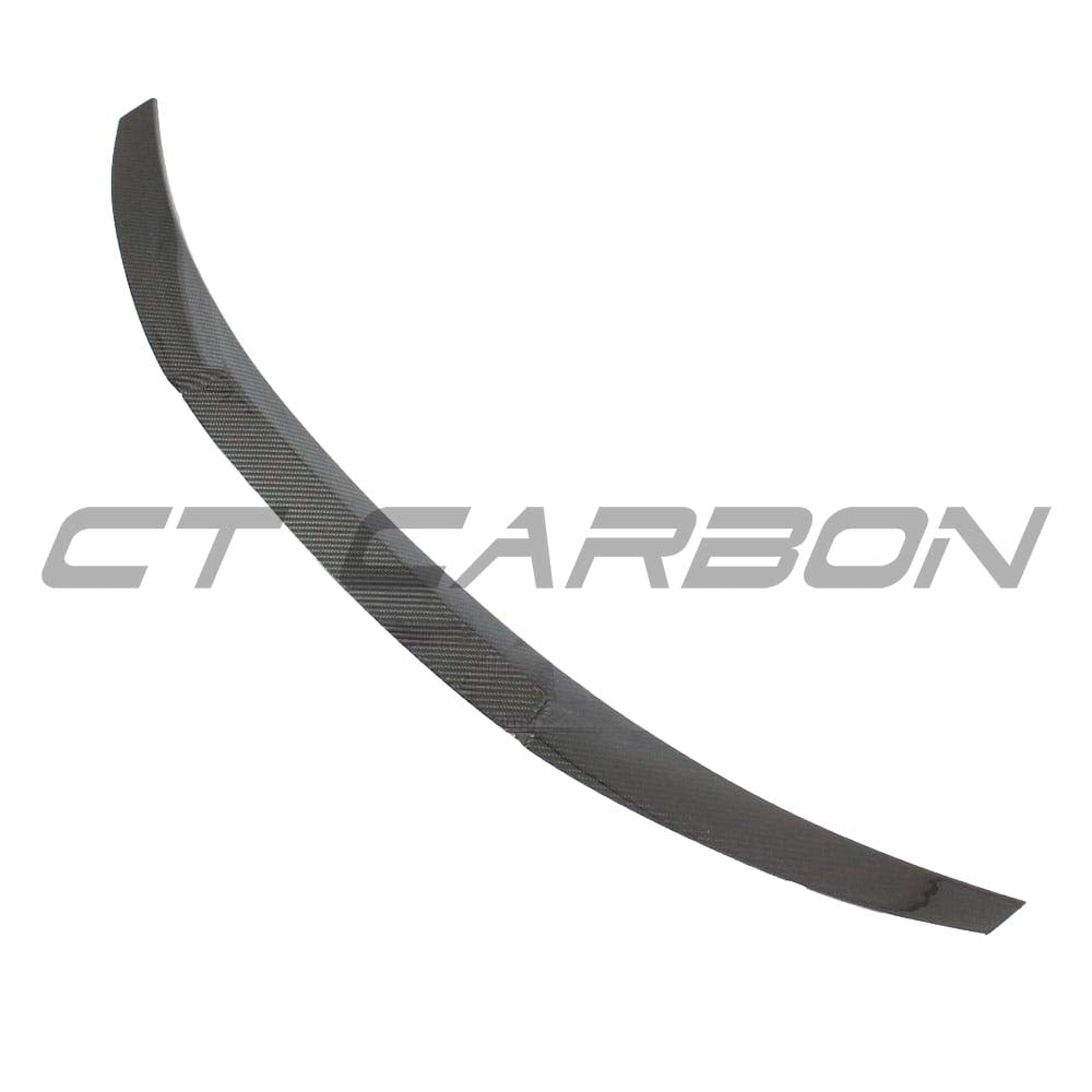 BMW G22 4 Series Carbon Fibre Kit by CT Carbon, featuring a V11 style carbon fibre spoiler on the car.