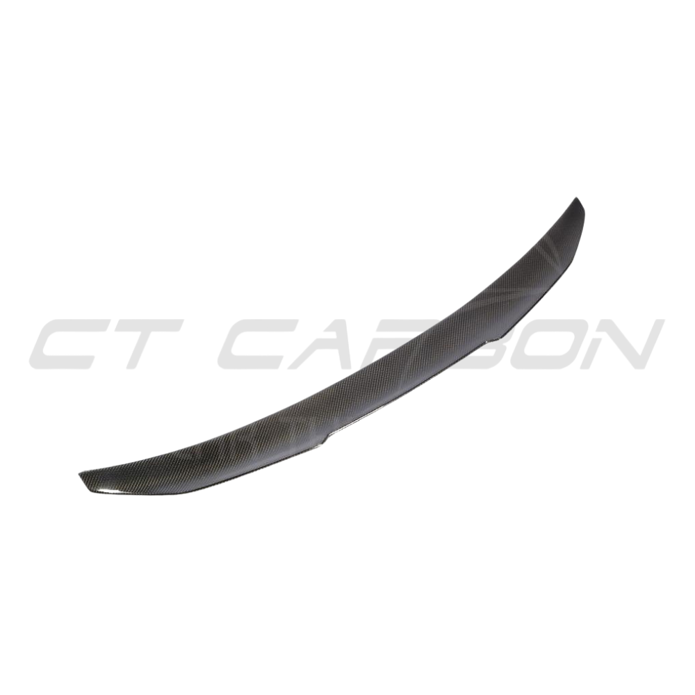 BMW G30 5 Series carbon fibre kit by CT Carbon, includes spoiler and ducktail for enhanced sporty appearance.