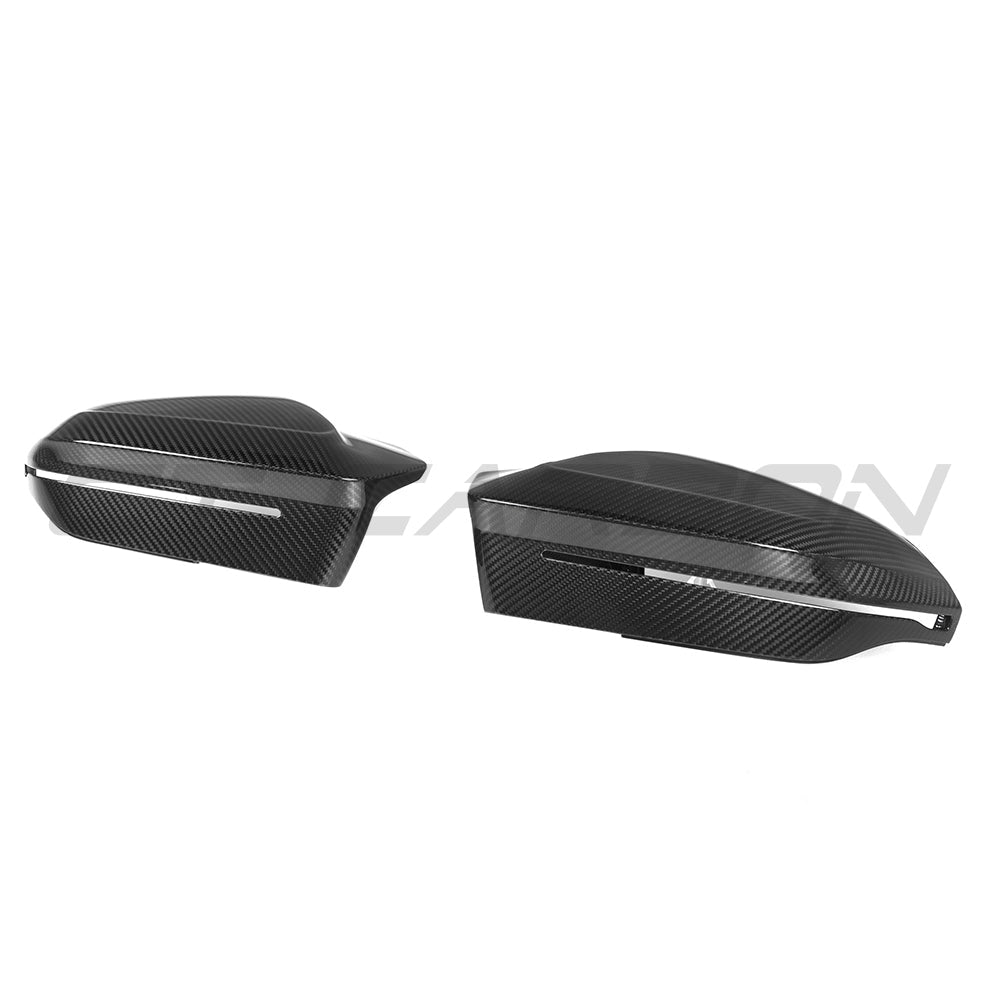 BMW M5 G90/G99 and i5 G60/G61 carbon fiber mirror accessories, LHD, by CT Carbon, featuring sleek pre-preg carbon fiber design.