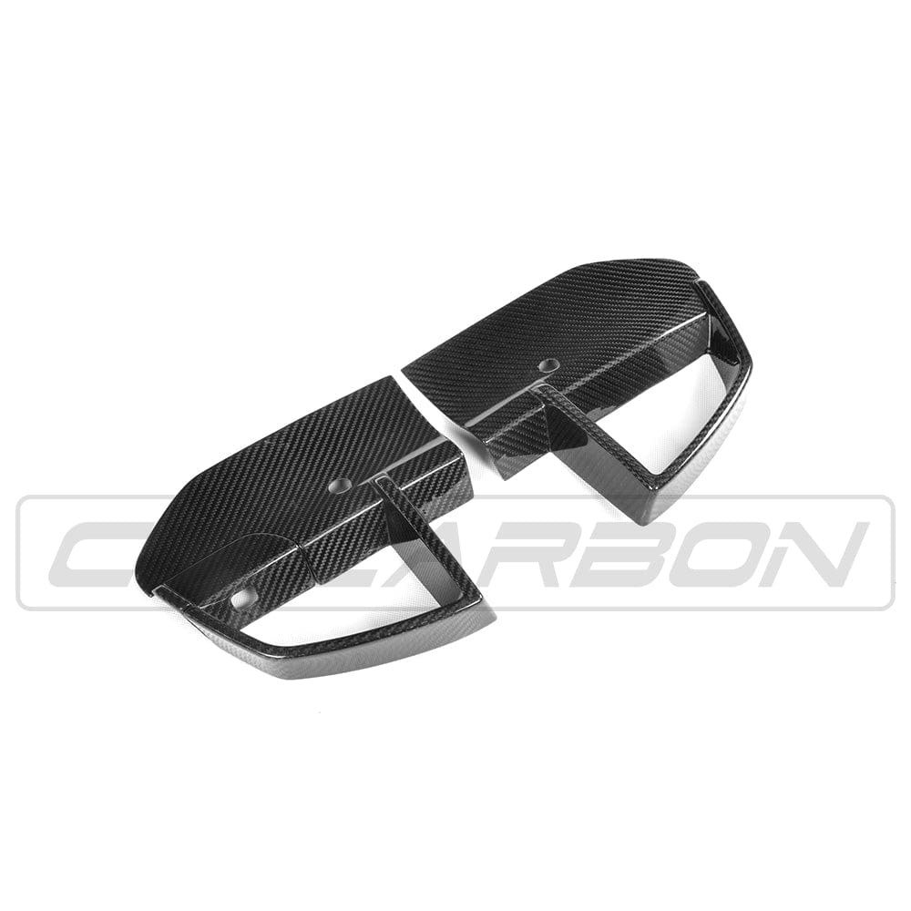 BMW X3 G01 carbon fiber front bumper vent trims by CT Carbon, close-up view showing sleek, lightweight automotive accessory details.
