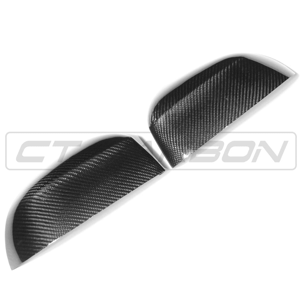 BMW X3, X4, X5, X6 carbon fibre mirror covers by CT Carbon, OEM style, installed on vehicle, showcasing sleek, high-quality finish.