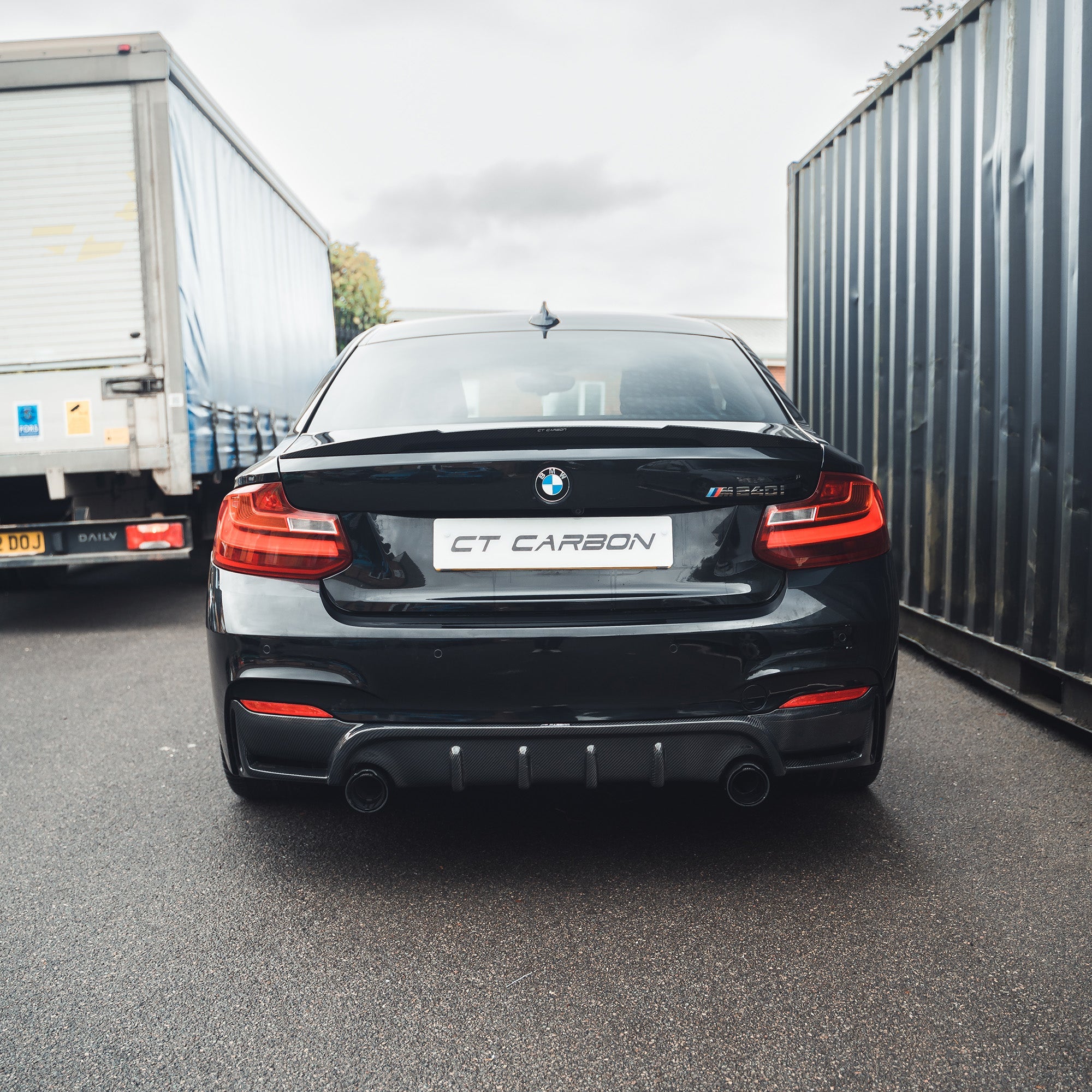 BMW F22 2 Series full carbon fiber kit by CT Carbon, featuring lightweight, high-gloss carbon fiber parts for the vehicle.