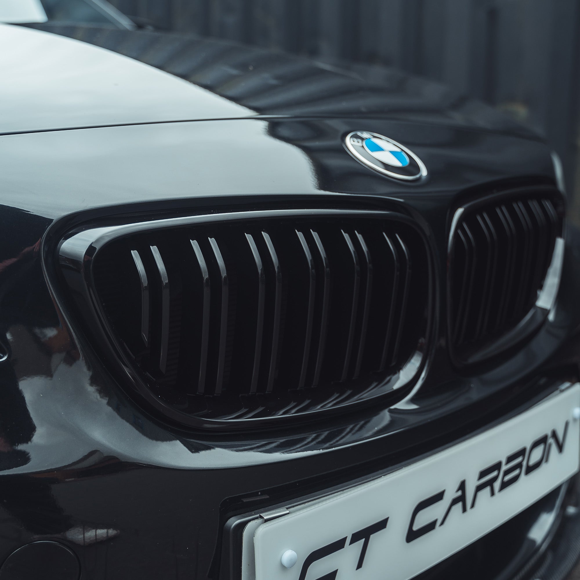 BMW M2 F87 & F22 2 Series double slat black grille by CT Carbon, showcasing sleek black grille design on a BMW 240i.