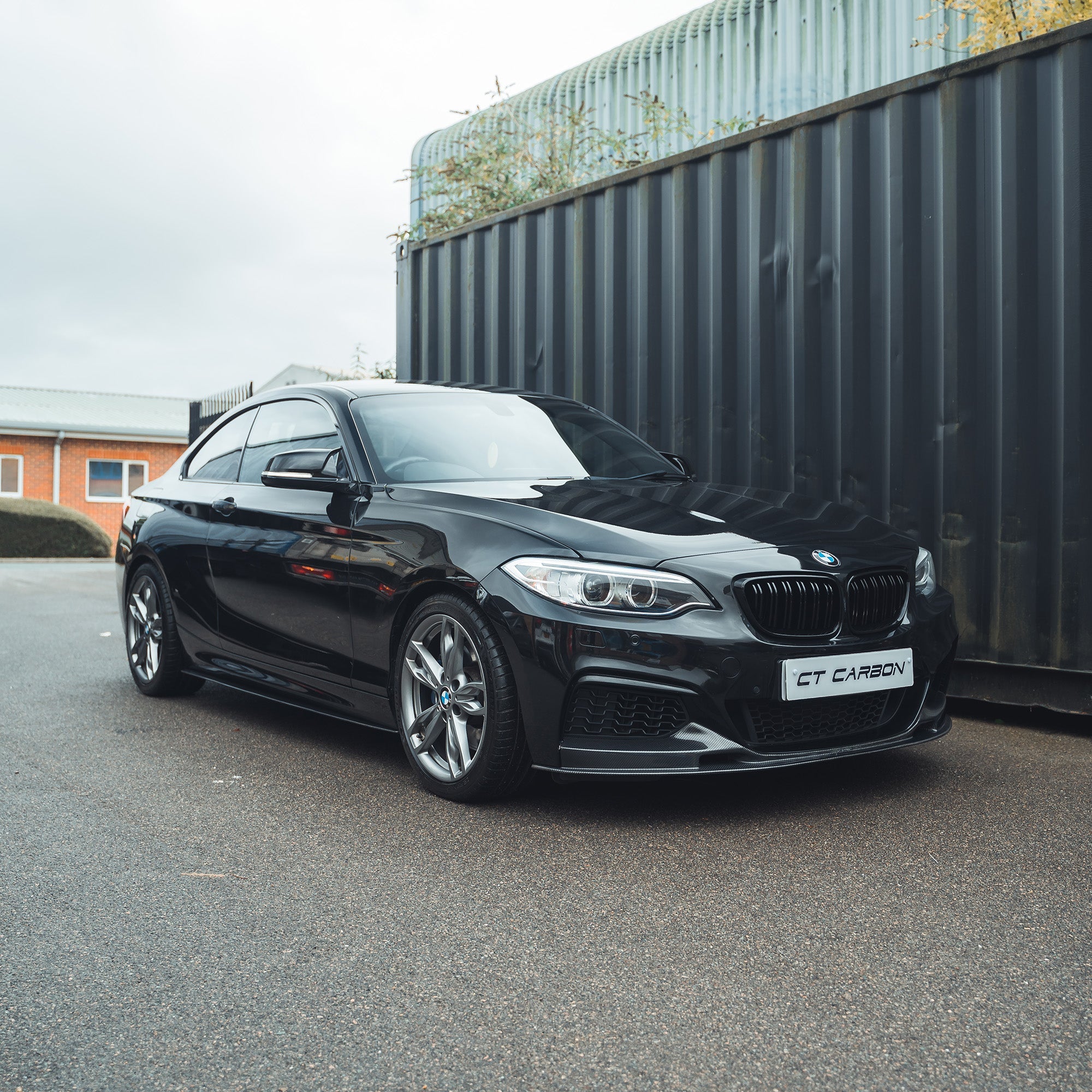 BMW F22 2 Series full carbon fiber kit by CT Carbon, showing detailed carbon fiber components on the car.