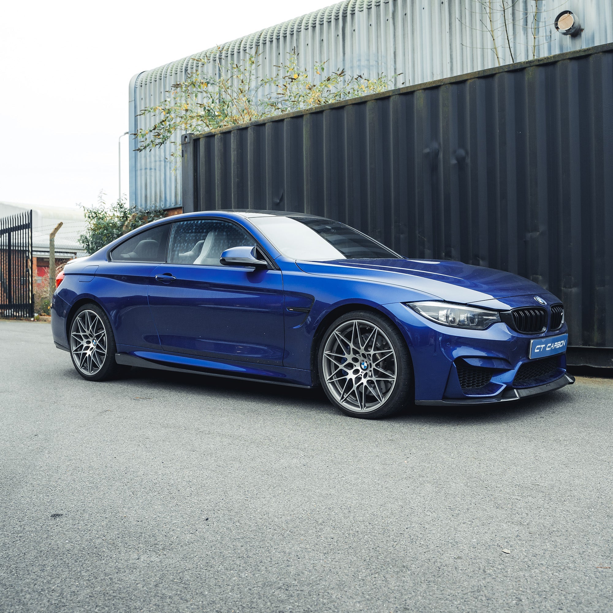 BMW M3 M4 F80 F82 carbon fibre side skirts by CT Carbon, showing sleek, lightweight aerodynamic design for sporty look.