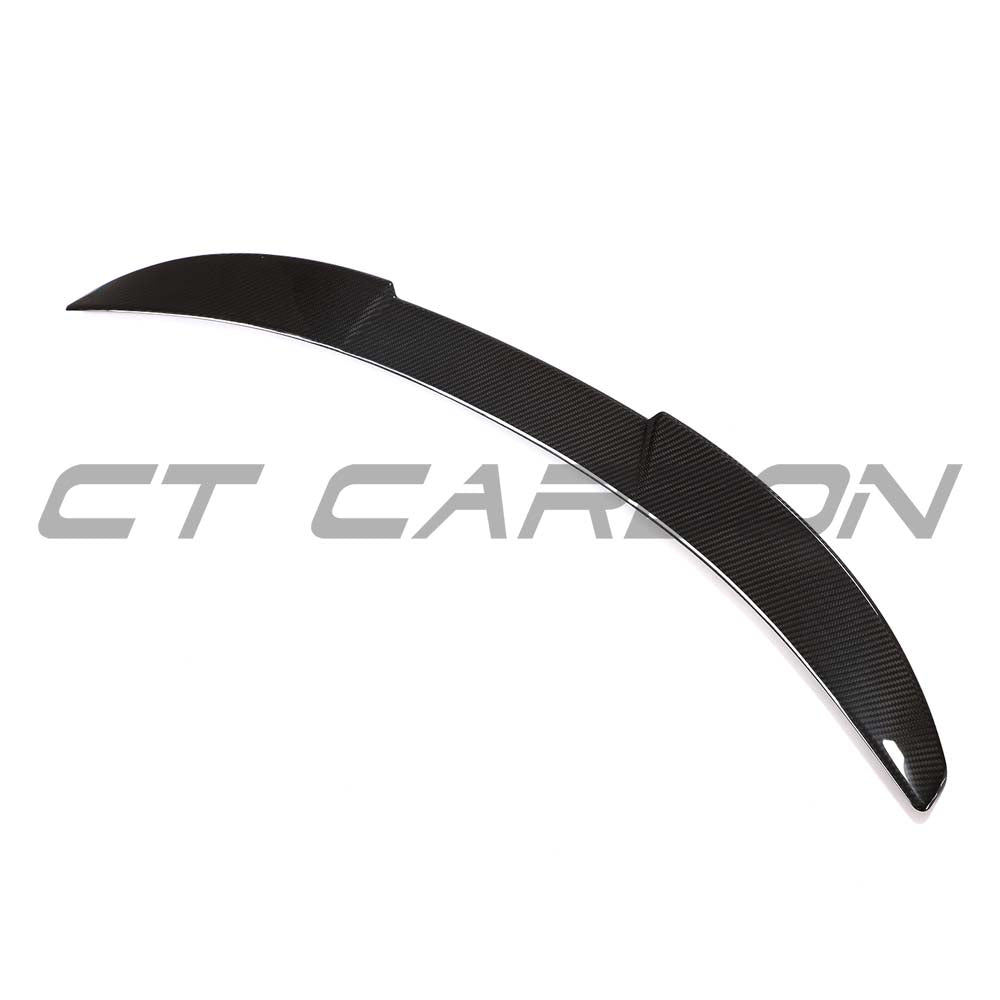 BMW G80 M3 full carbon fibre kit by CT Carbon, including a spoiler and aerodynamic body parts, showcasing sleek black carbon finish.
