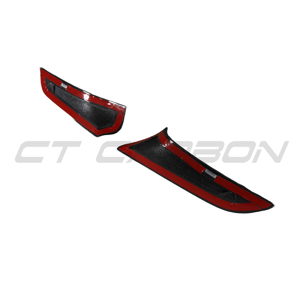 Carbon fiber front bumper vent trim for Toyota Supra 2019+ A90 by CT Carbon, shown on the vehicle's front bumper.