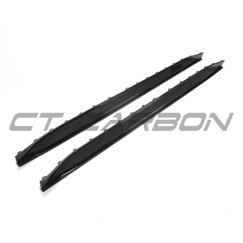 BMW G80 M3 full carbon fiber kit by CT Carbon, showing side skirts with a sleek carbon finish.