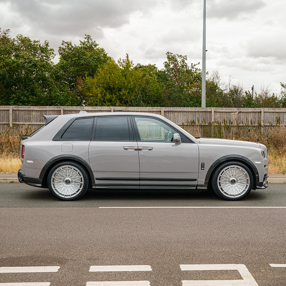 Carbon fibre side skirts for Rolls Royce Cullinan by CT Carbon, featuring sleek, aerodynamic splitter design.