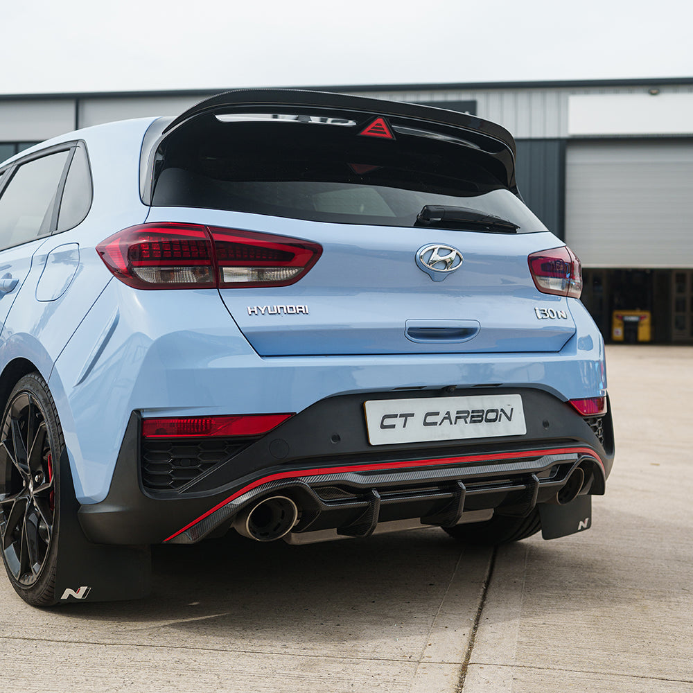 CT Carbon Hyundai i30N carbon fiber diffuser for facelift model, showcasing sleek automotive design and high-quality craftsmanship.