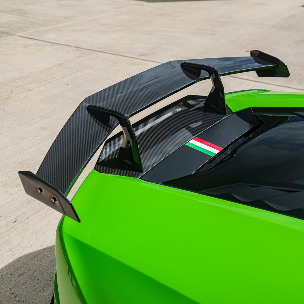 CT Carbon Lamborghini Huracan LP-580/LP-610 EVO spoiler, lightweight carbon fibre wing with aerodynamic design on a sports car.