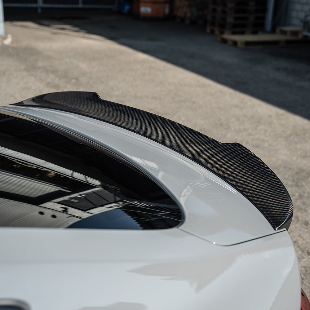 Carbon fiber spoiler for Audi A5/S5/RS5 B9.5 Sportback 2016-2024 by CT Carbon, shown installed on vehicle with sleek aerodynamic design.