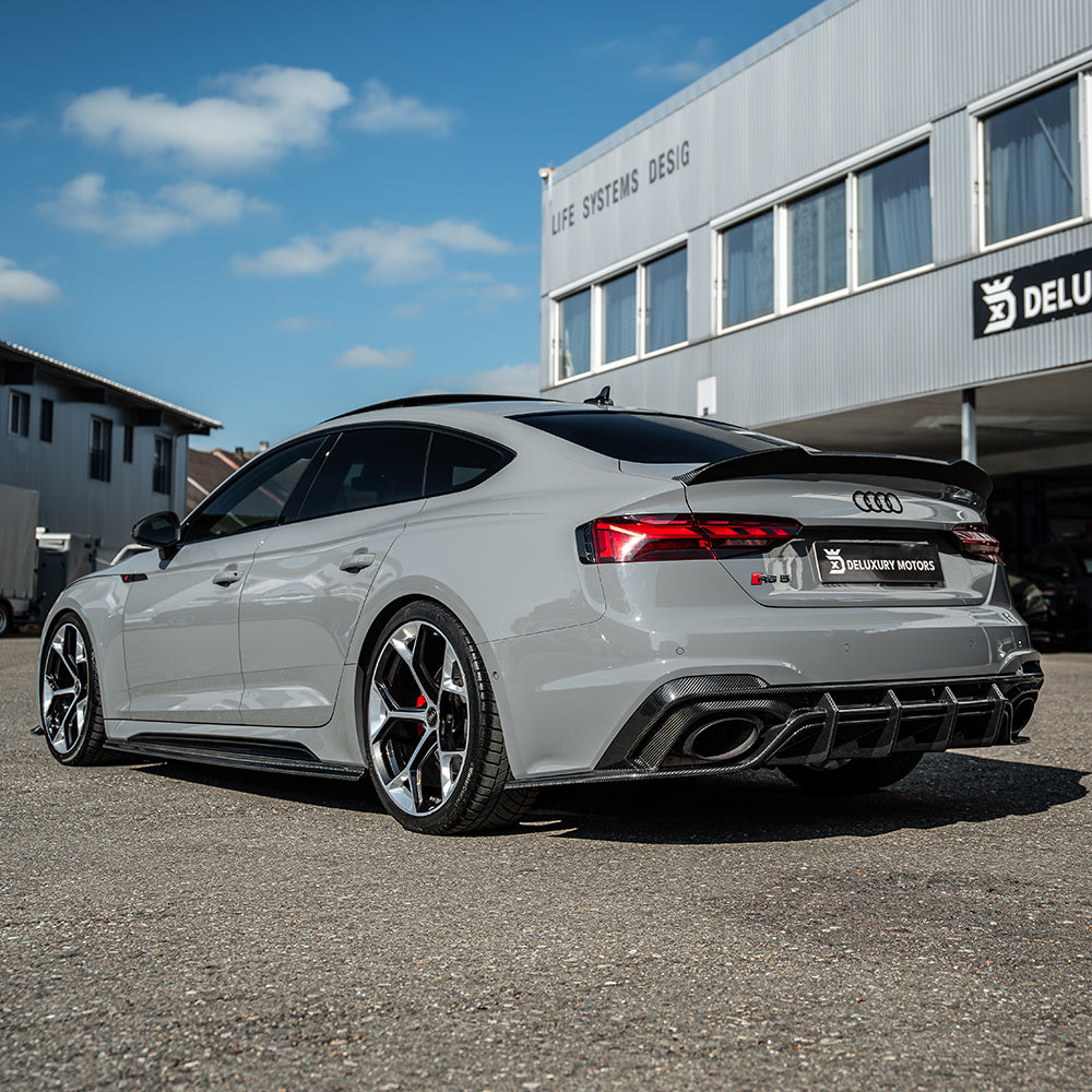 Full car view of a 2020-2024 Audi RS5 B9.5 Sportback with CT Carbon full carbon fibre kit, showcasing sleek, high-performance exterior accents.