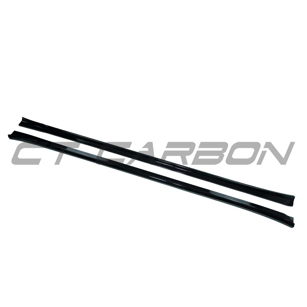 BMW G01 G02 G08 F97 F98 X3 X4 X3M X4M 2018-2022 CT Carbon gloss black side skirts installed on vehicle.