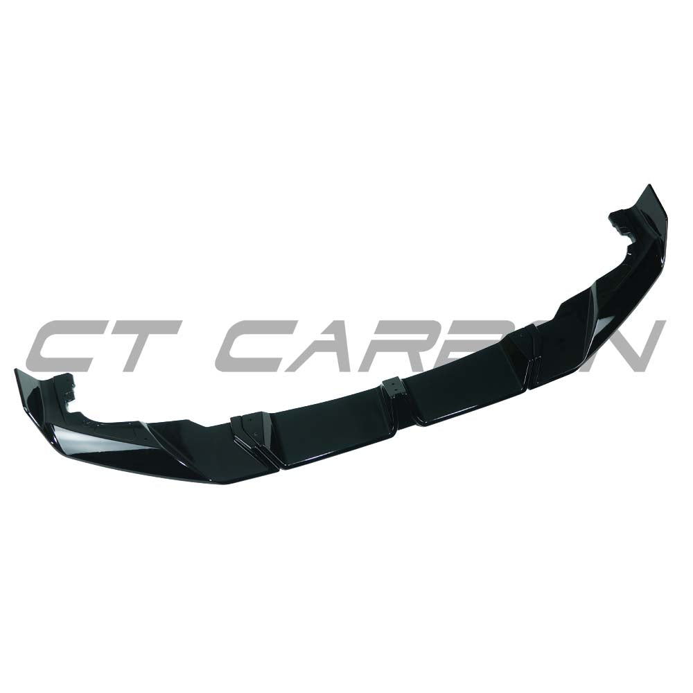 Gloss black CT Carbon splitter for BMW X5M F95 LCI 2023+ with detailed carbon fiber finish, installed on the front bumper.
