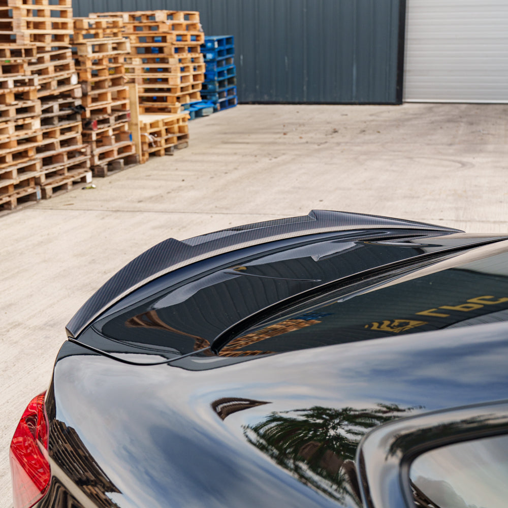 BMW F82 M4 Coupe 2014-2020 CT Carbon V4 full carbon fiber kit, includes front bumper, side skirts, and rear diffuser.
