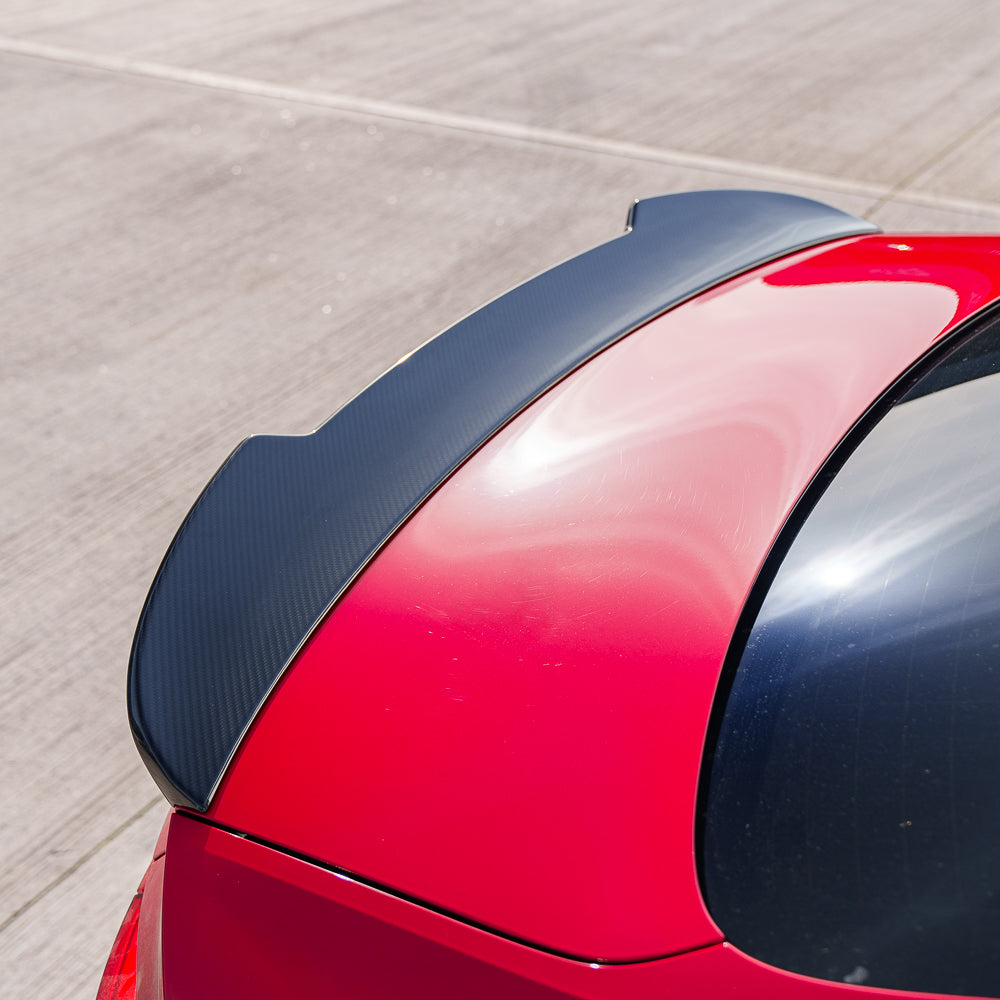CT Carbon spoiler for Audi A5/S5/RS5 B9/B9.5 coupe, made of carbon fiber, shown on a 2016-2025 model in the image.