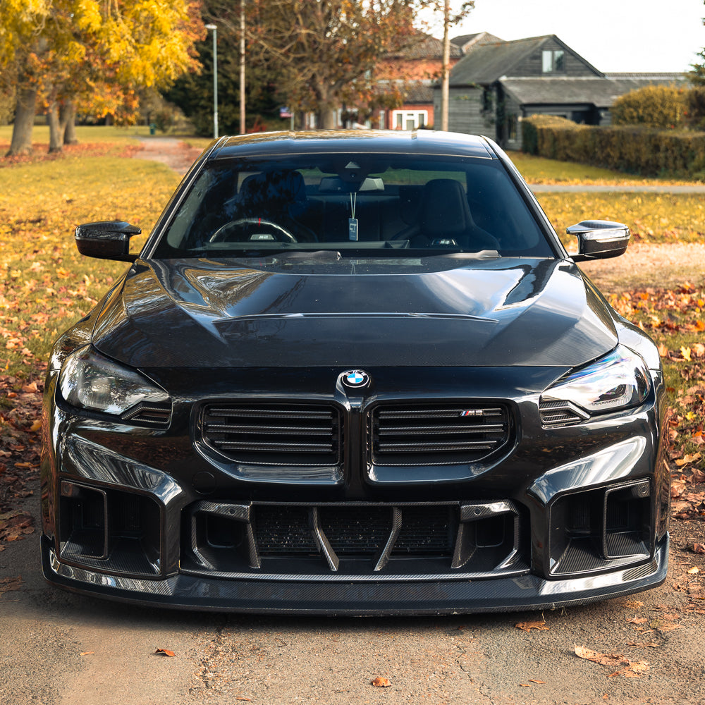 BMW G42 2 Series and G87 M2 carbon fibre front bonnet by CT Carbon, lightweight racing hood with vent details.