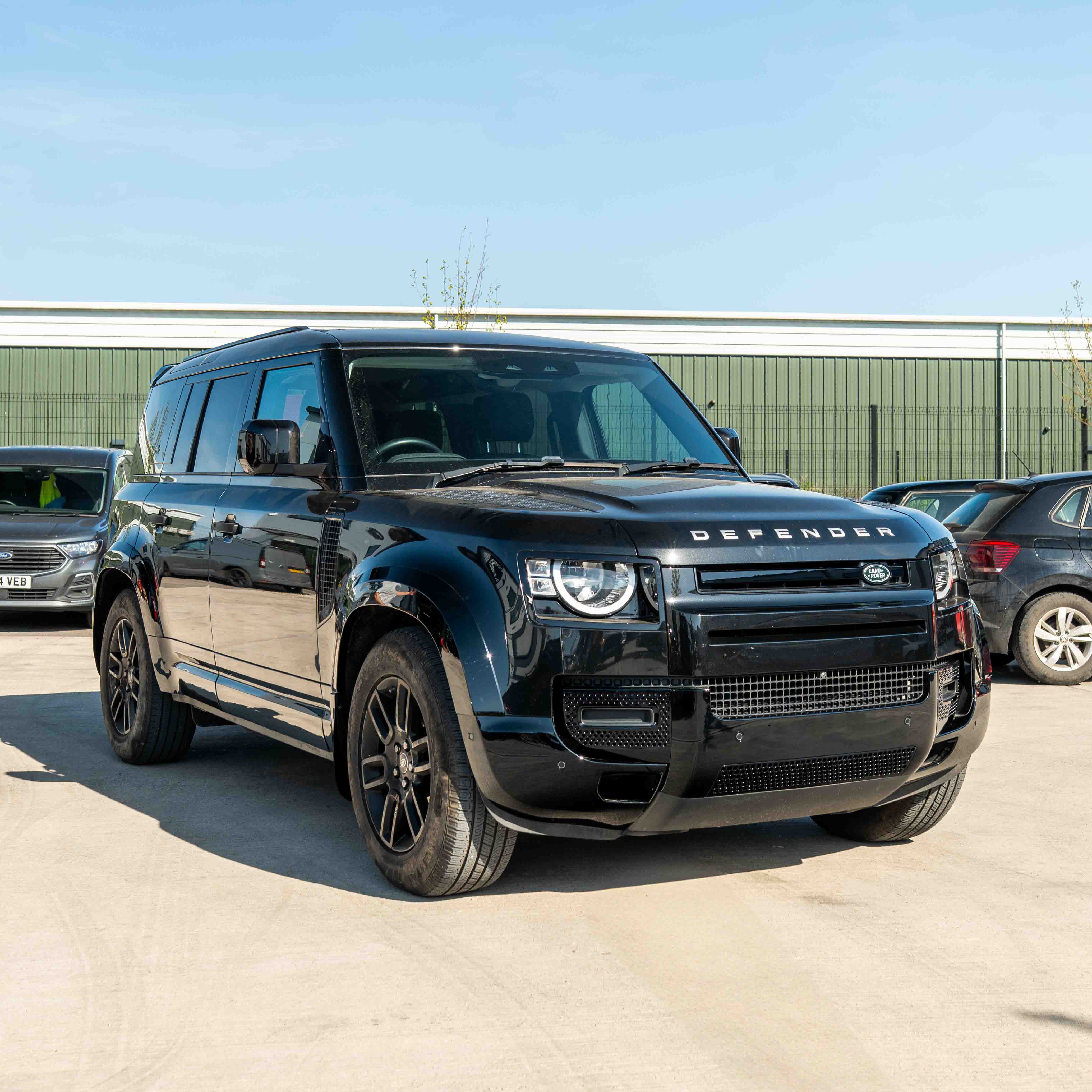 CT Carbon Land Rover Defender L663 110/90 gloss black front and rear middle trim kit, durable automotive interior accessory.