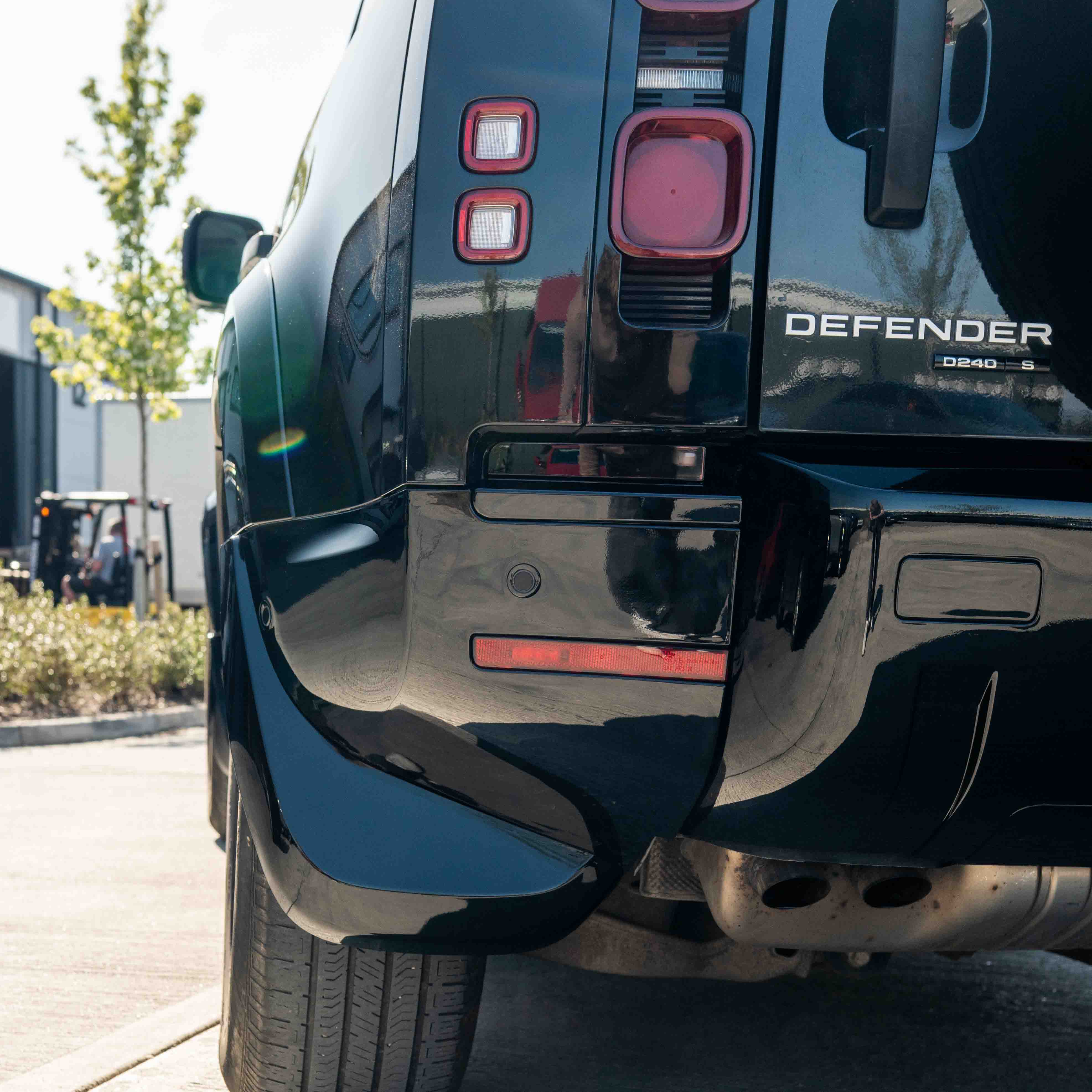 CT Carbon Land Rover Defender L663 110 & 90 gloss black middle trim kit, front and rear, for stylish interior enhancement.