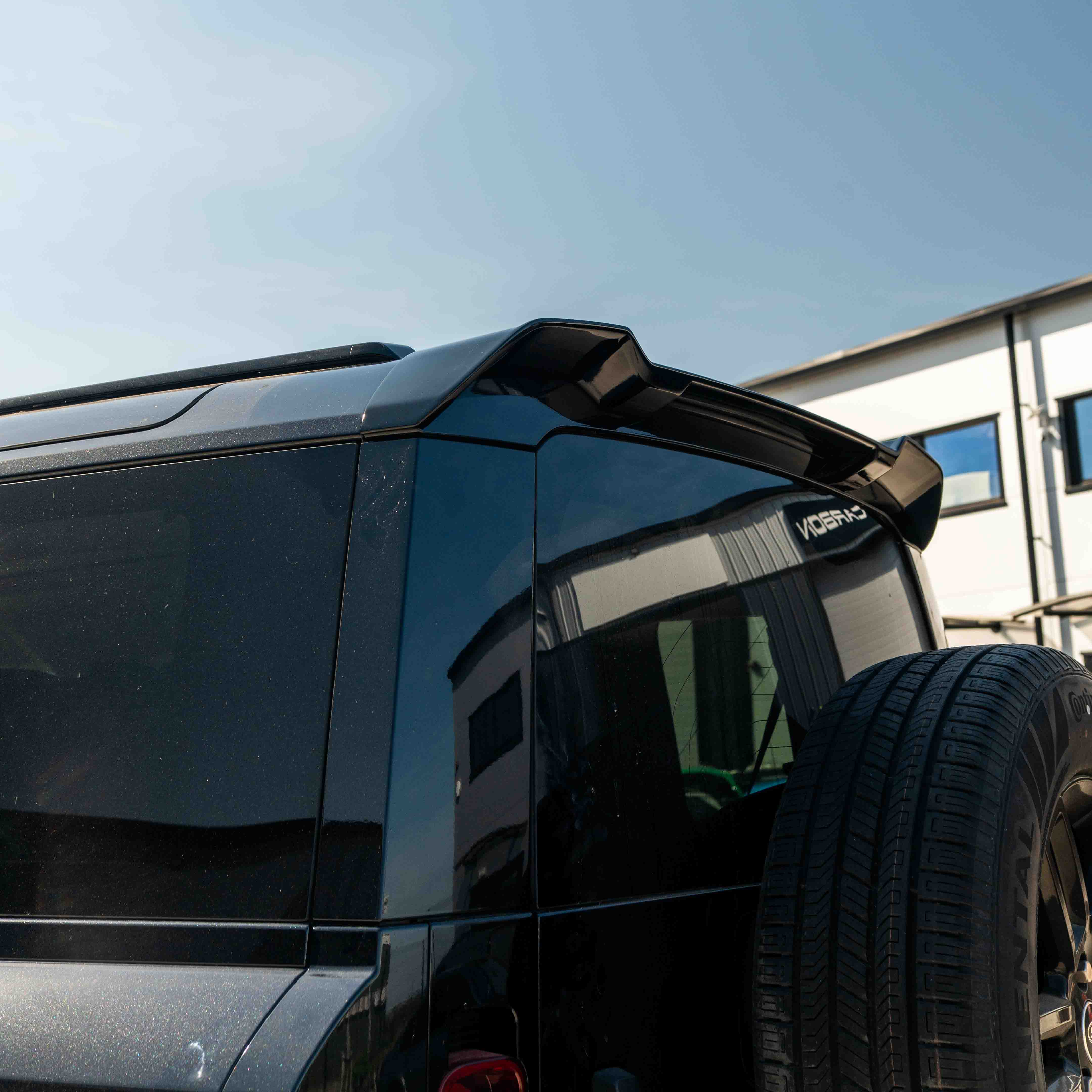 CT Carbon Land Rover Defender L663 110 & 90 gloss black front and rear middle trim kit, stylish vehicle interior upgrade.