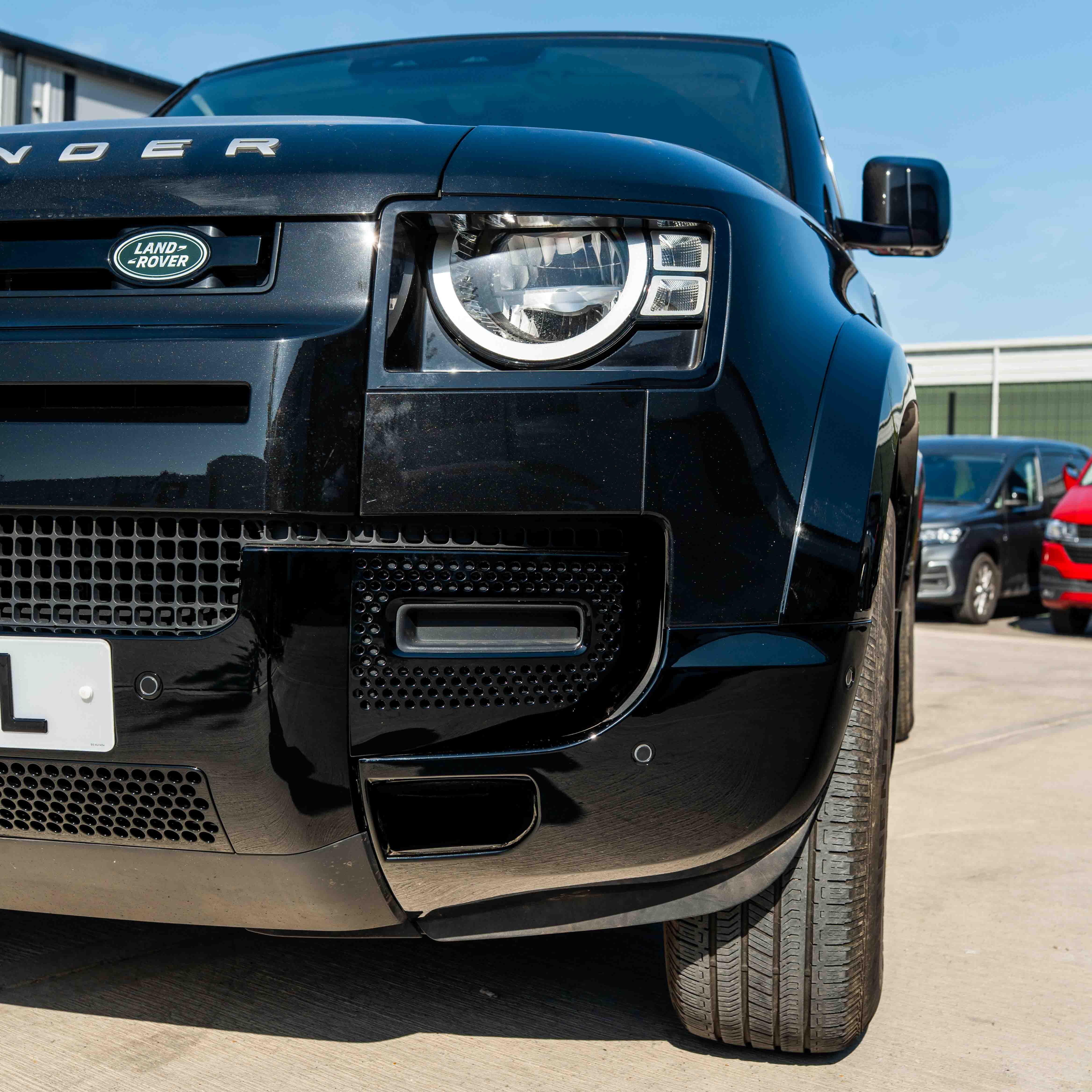 CT Carbon Land Rover Defender L663 110 & 90 gloss black middle trim kit for front and rear, stylish vehicle interior upgrade.