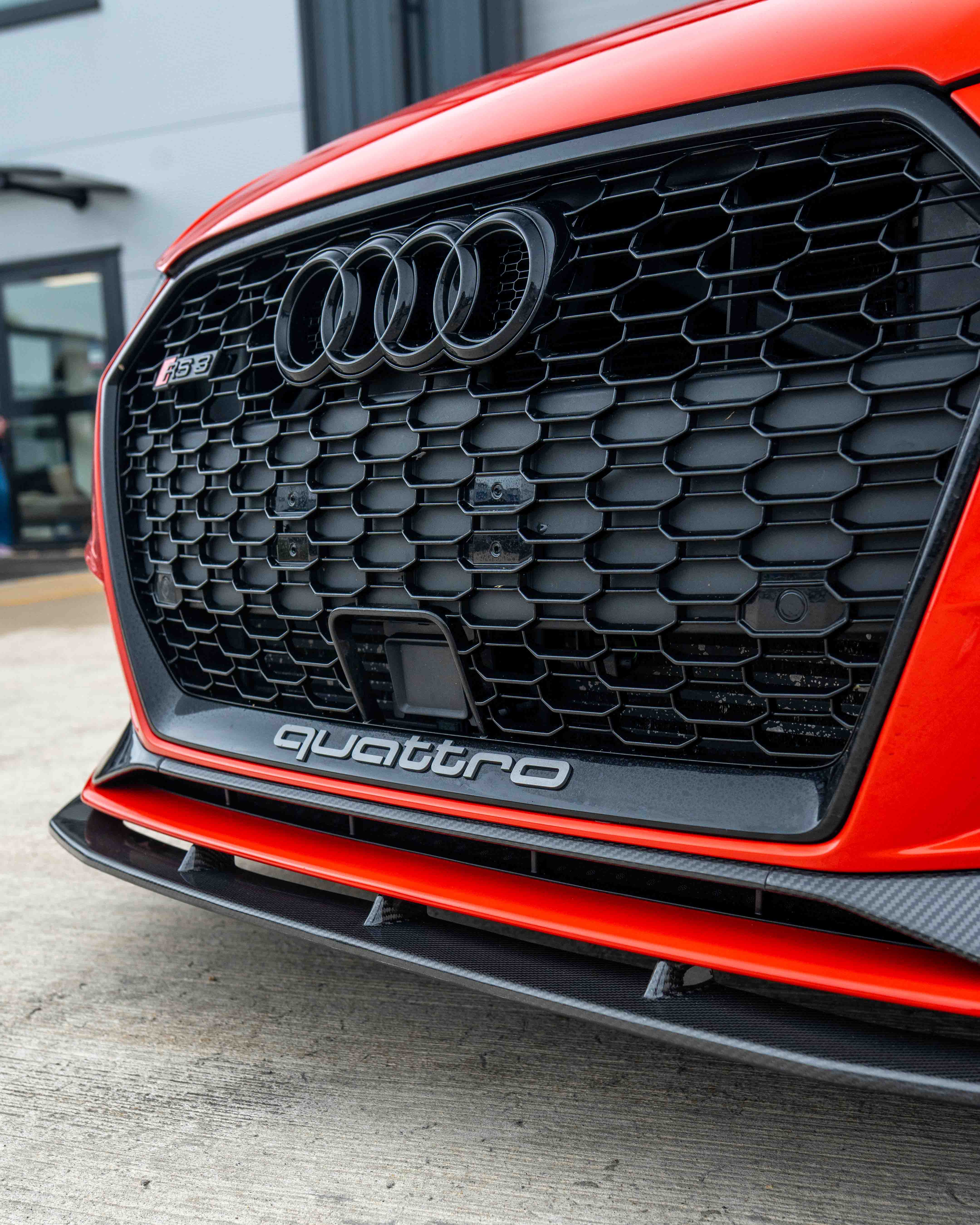 Audi RS3 8V facelift carbon fibre bumper trim by CT Carbon, close-up of sleek, lightweight automotive accessory for enhanced style.