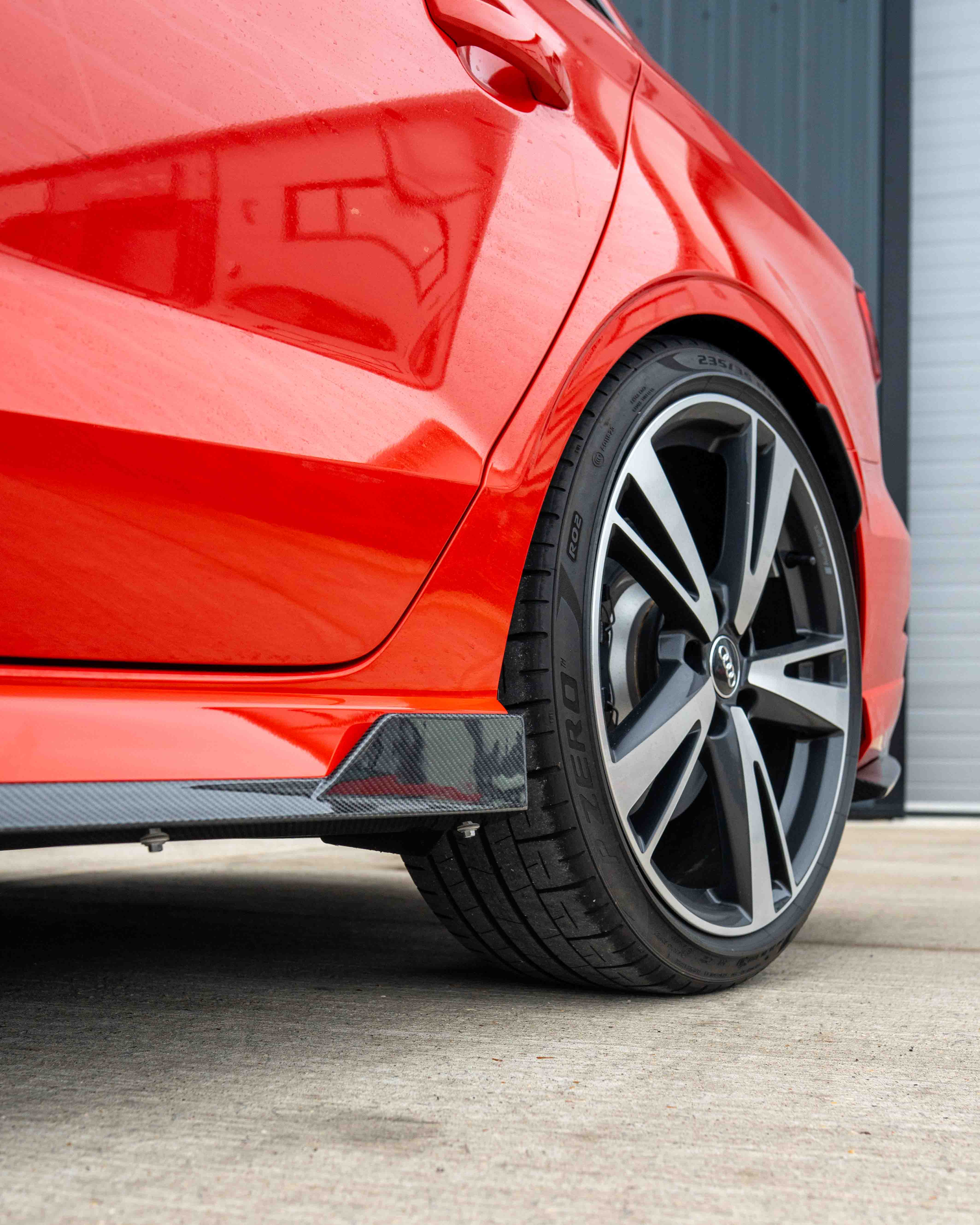 Carbon fiber side skirts for Audi A3/S3/RS3 8V saloon by CT Carbon, featuring sleek V2 design and aerodynamic styling.