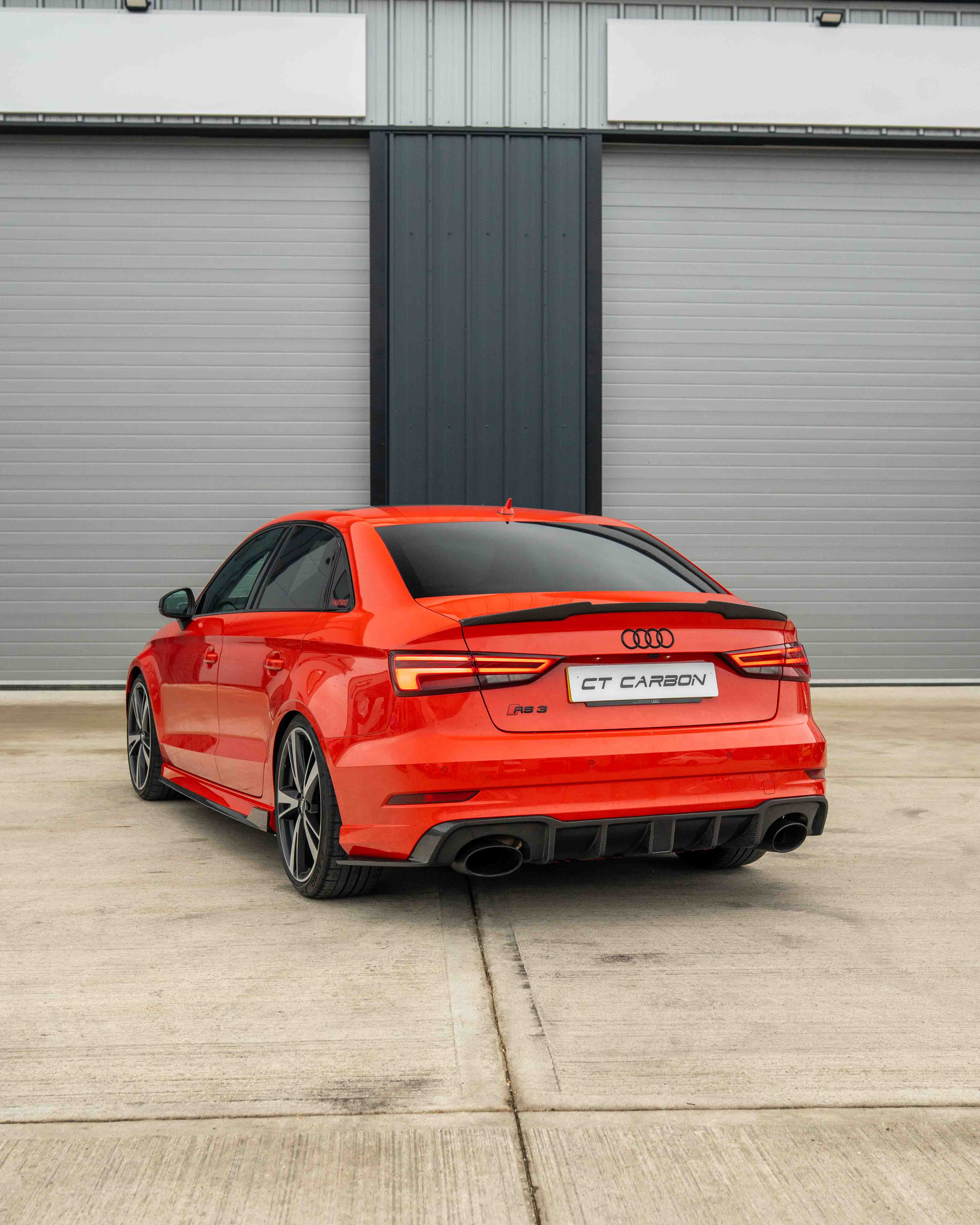 Carbon fibre spoiler for Audi A3 S3 RS3 8V saloon by CT Carbon, featuring a sleek aerodynamic design on the vehicle's rear.