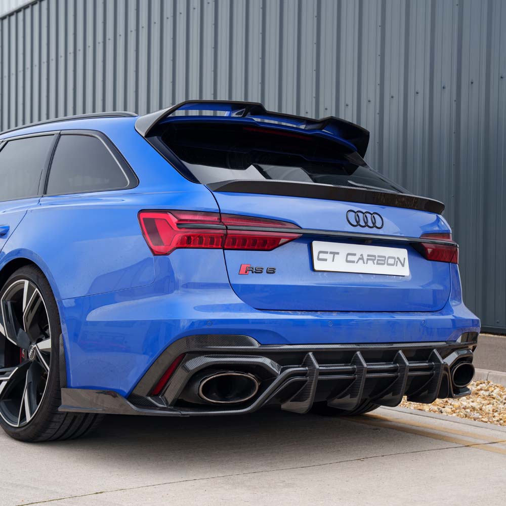 Audi RS6 C8 2019+ CT Design full carbon fiber rear end kit installed on the vehicle, showcasing sleek carbon fiber details and finish.