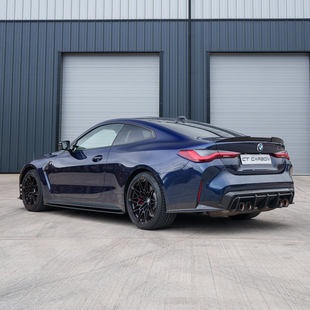 BMW M4 G82/G83 carbon fibre rear bumper corners by CT Carbon, V2 accessory, showcasing sleek, lightweight carbon fiber design.