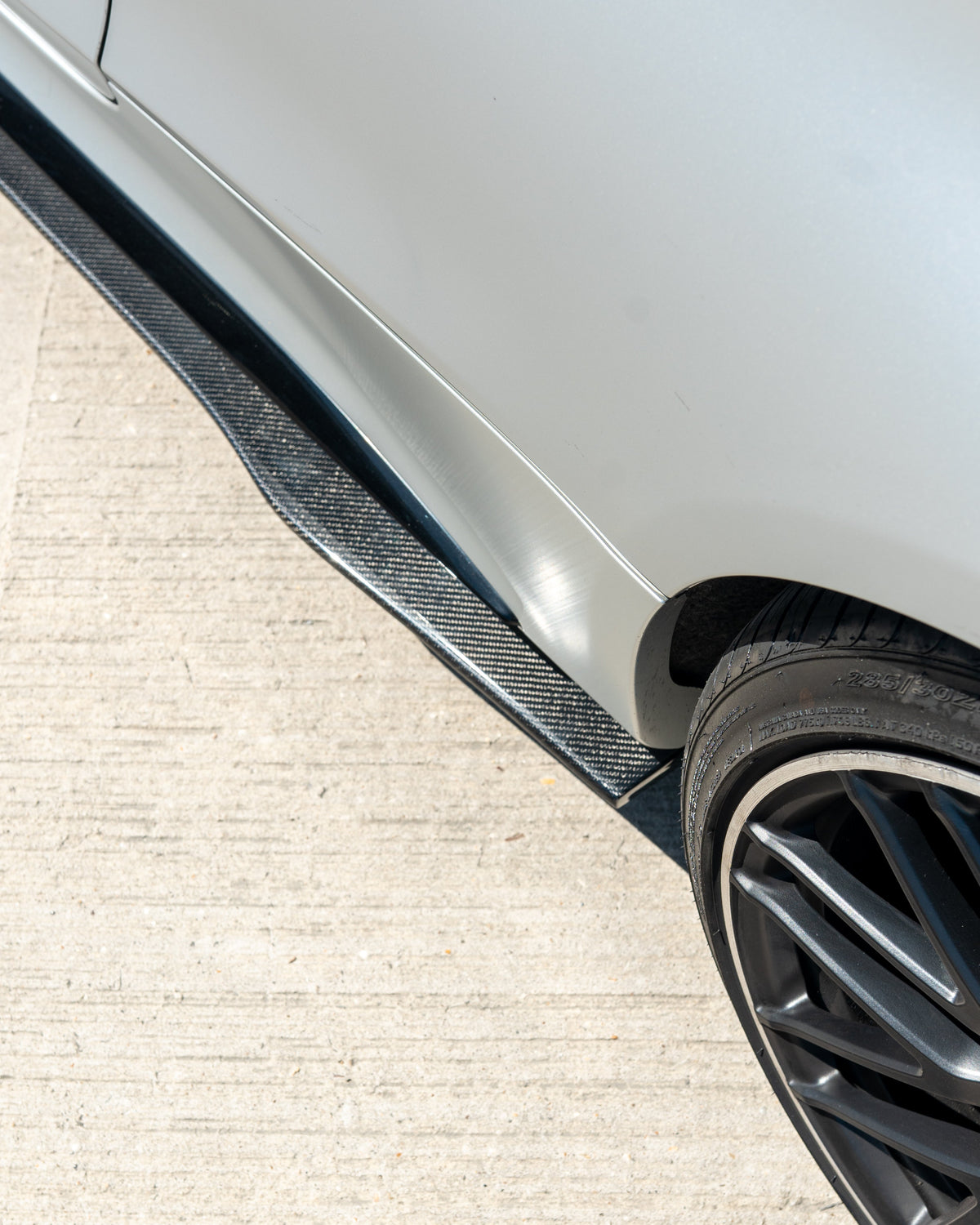 CT Carbon side skirts for Mercedes W205 C63 and C63S coupe and saloon, showcasing sleek carbon fiber design and installation details.