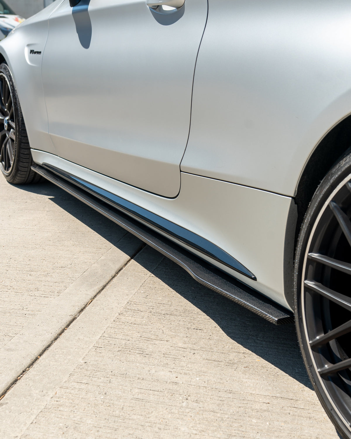 CT Carbon Mercedes W205 C63 and C63S coupe and saloon side skirts in carbon fiber, shown on the car's side profile.