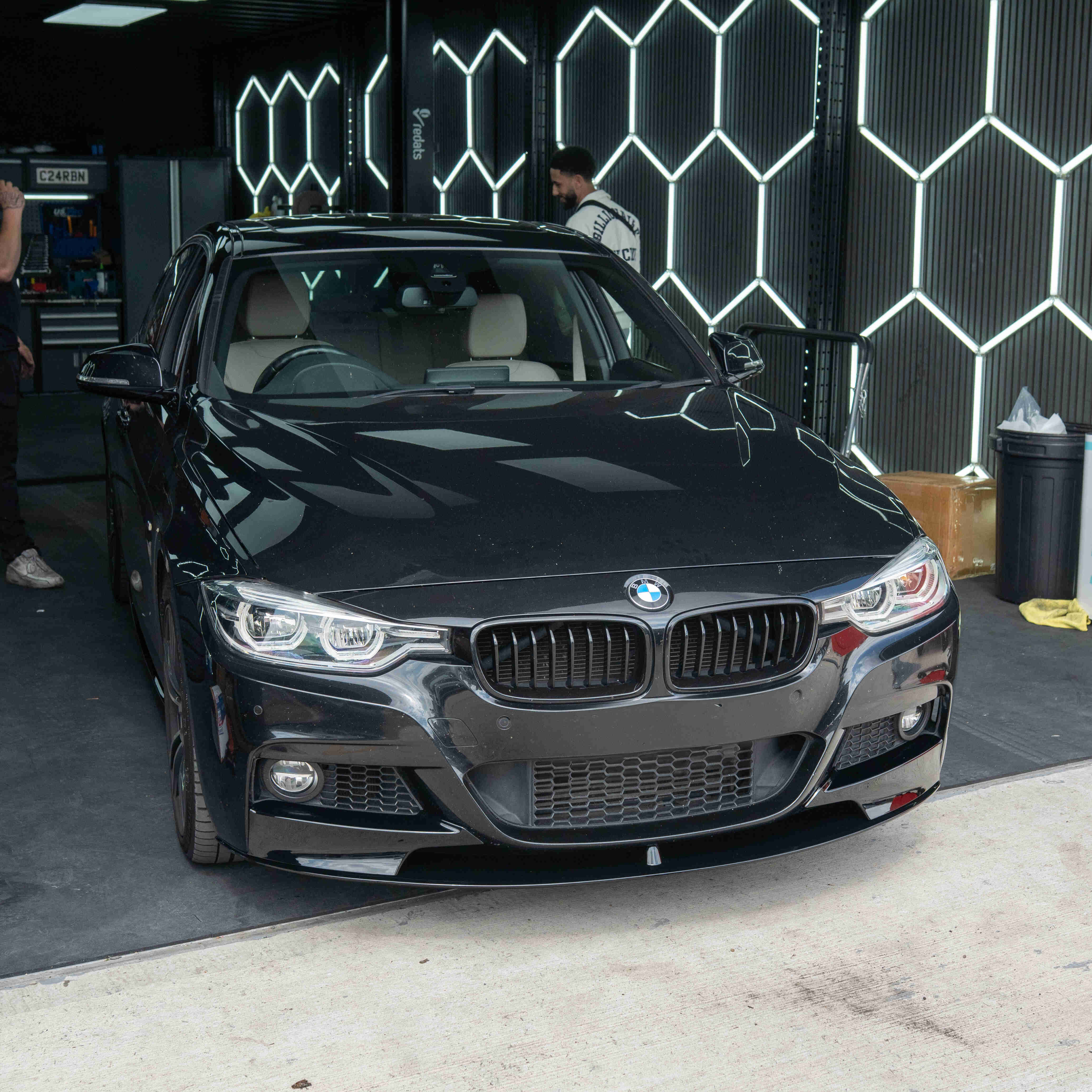 BMW 3 Series F30 F31 GLOSS BLACK splitter by CT Carbon, close-up view of the sleek aerodynamic car splitter.