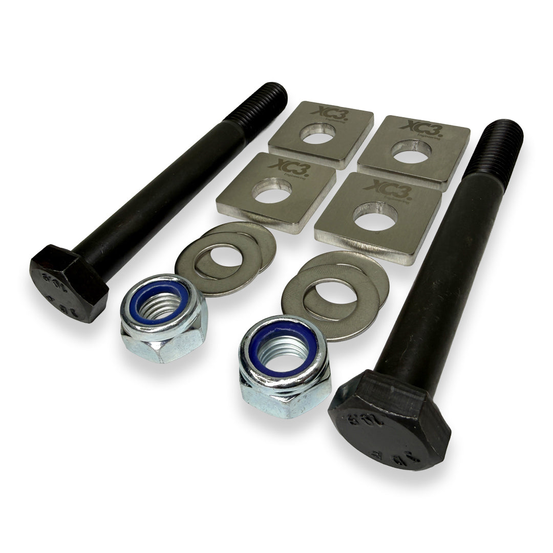 BMW M3 E9X E92 camber lockout shims for suspension and alignment by XC3 Engineering, shown in a close-up image.